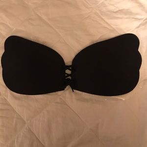 Black strapless bra that ties in the front size D